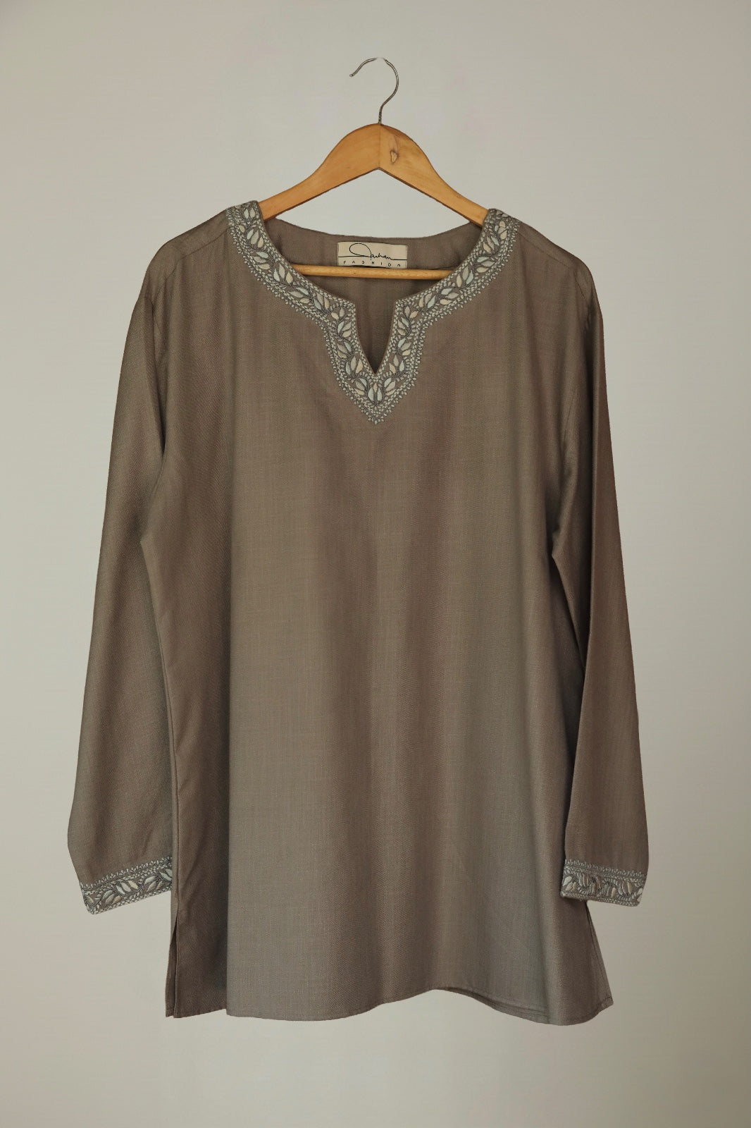 Brown soft-touch cotton kurta showcasing relaxed silhouette and artisan detailing
