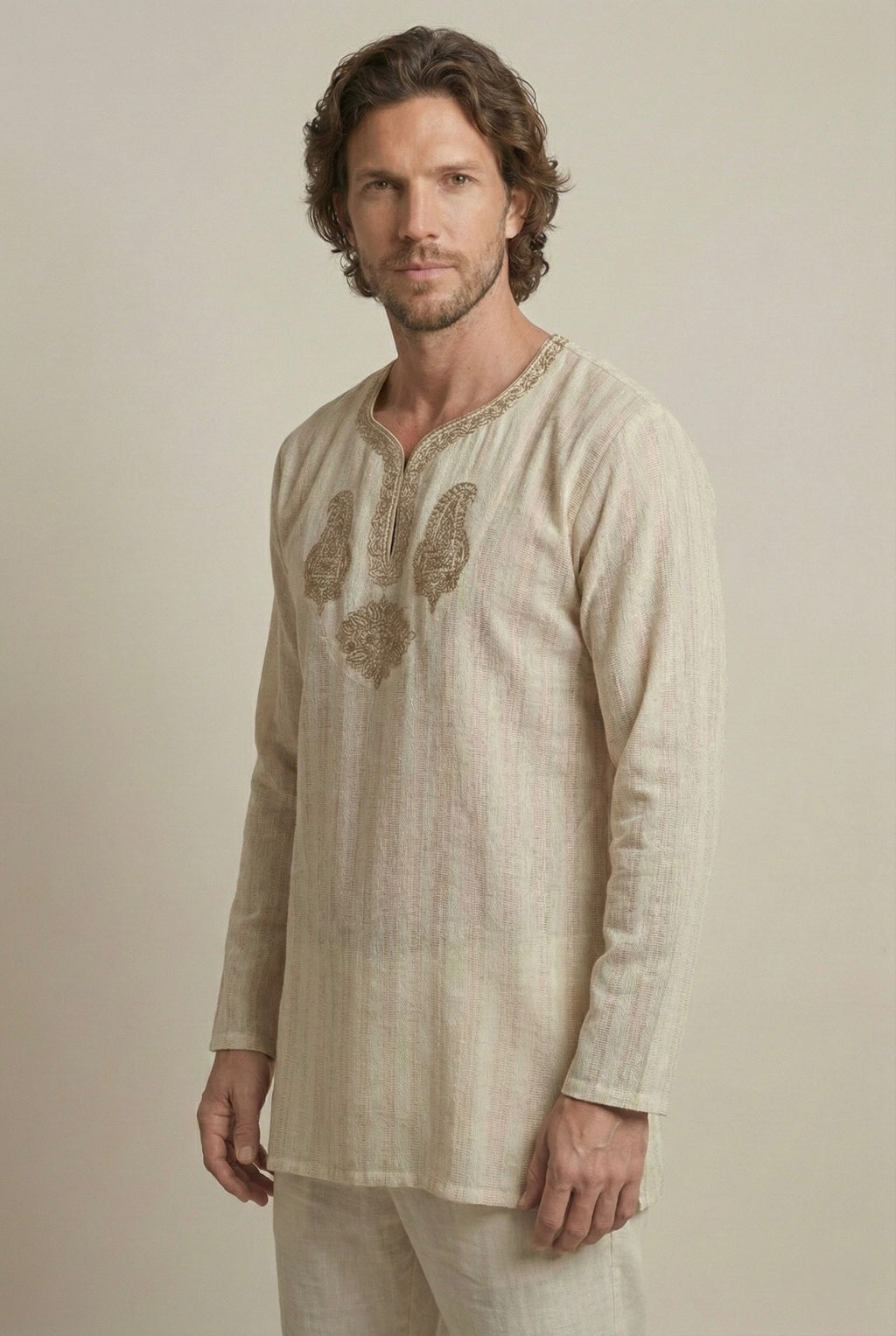 Full-body view of beige handcrafted cotton kurta with subtle stripe texture.