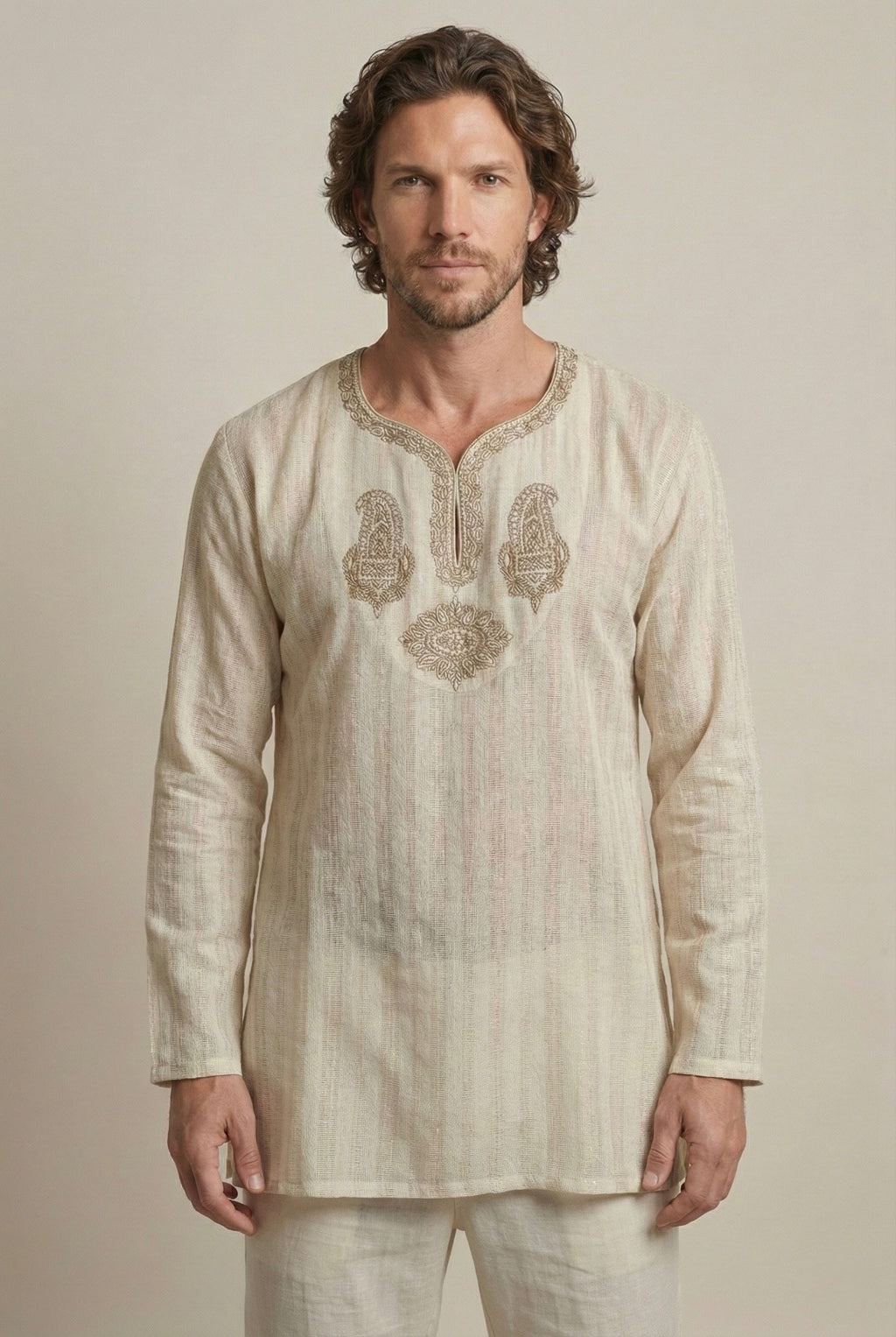 Beige soft-touch cotton kurta showcasing relaxed fit and handcrafted detailing.